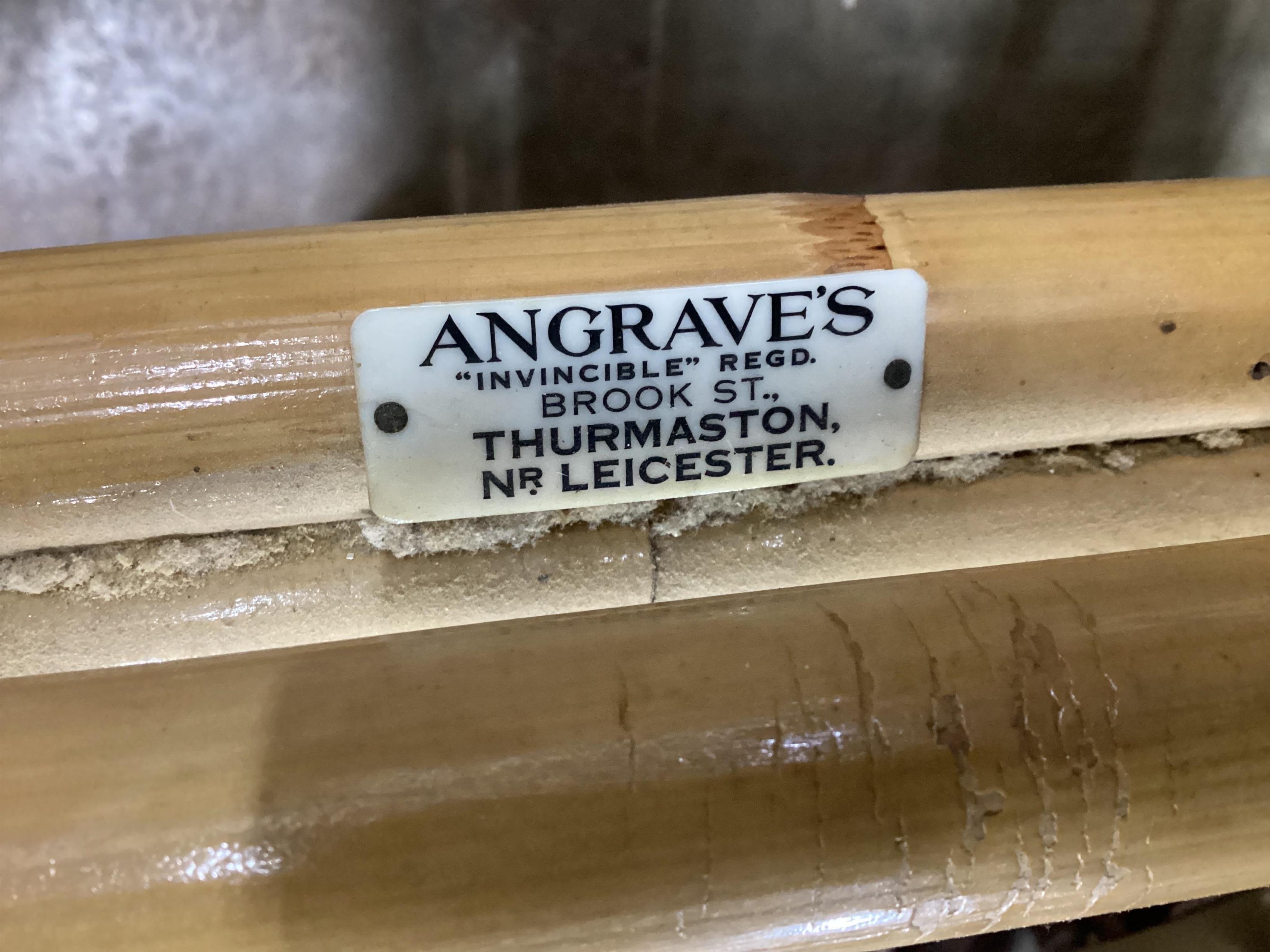 A mid century Angrave’s of Leicester “Invincible” bamboo suite comprising a pair of chairs, one brass mounted and reclining, a pair of matching footstools and a circular glass top occasional table, all with recently reup